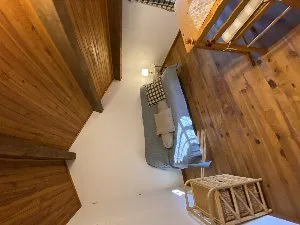 Pièce de vie de La Casalissa avec le clic-clac d'appoint, Chez Yves