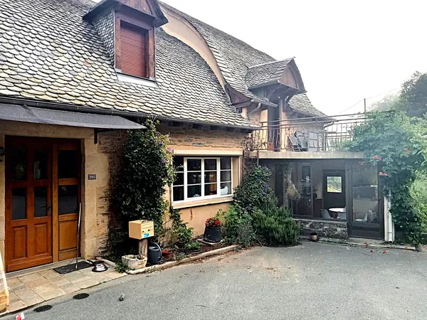 Entrée de la location par la véranda