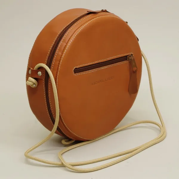 Sac Rond en cuir. Fabrication artisanale Française., 