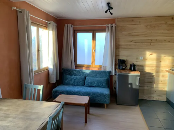 Coin salon avec canapé convertible, Emeline Lebouteiller