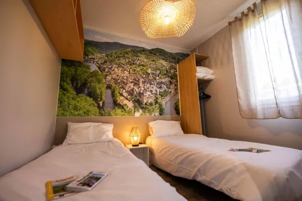Chambre à 2 lits, chalets du bastié 12140 Entraygues sur Truyère
